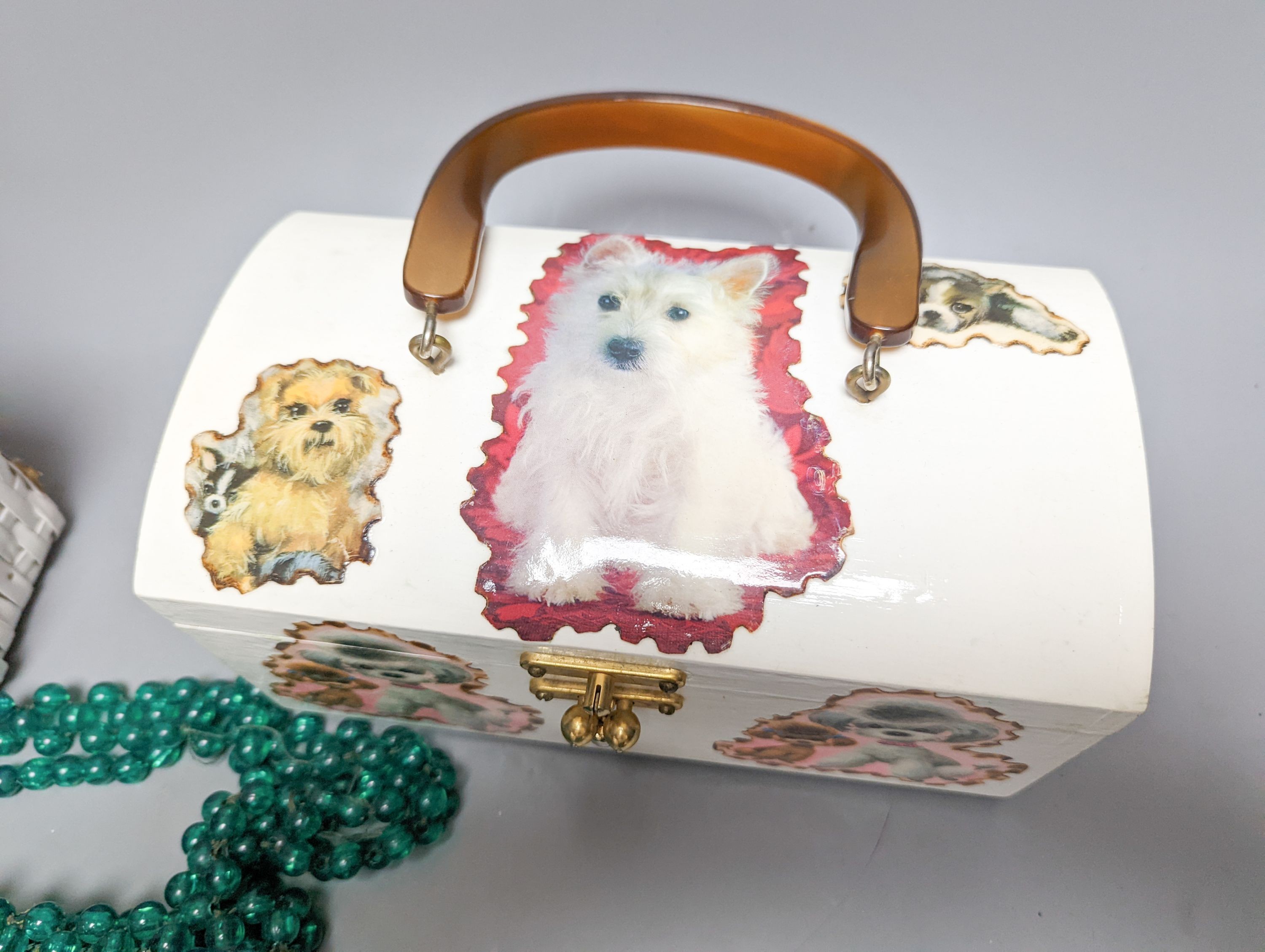 Two American 1950's-60's novelty handbags and three beaded evening bags